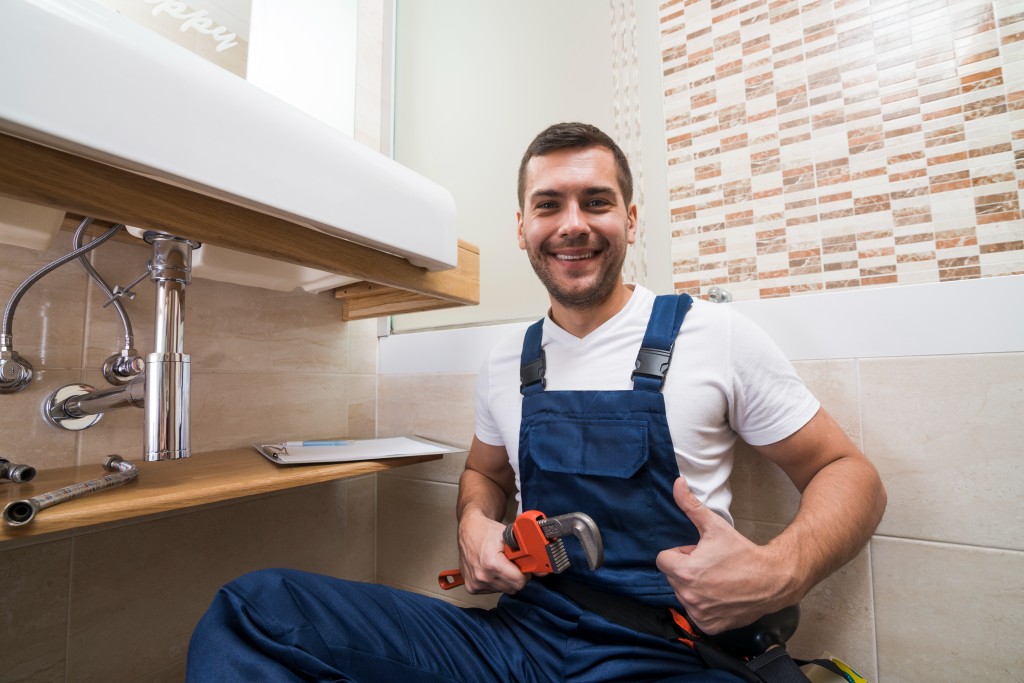happy plumber